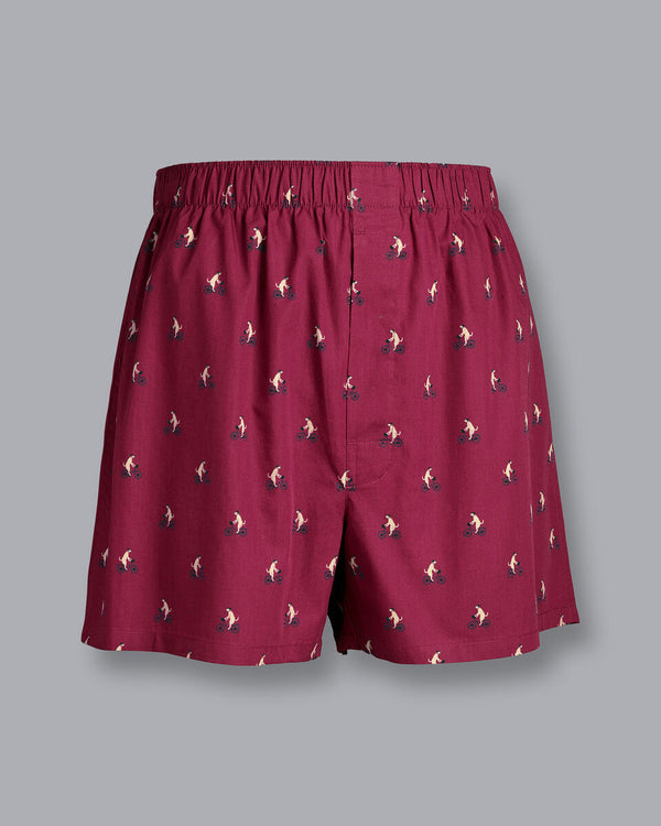 Cherry pink dog on bike woven boxers